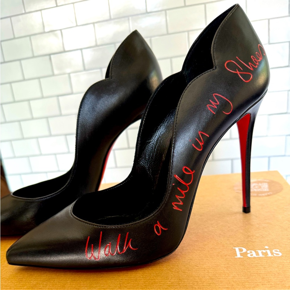 Christian Louboutin “Walk a Mile in My Shoes” black leather pumps. Size 38.5